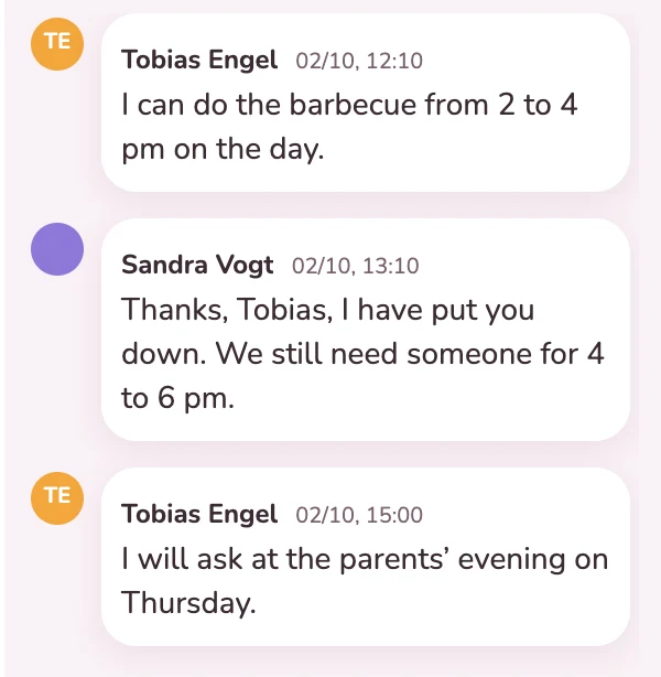 A helper and the event lead agree the shifts on the card